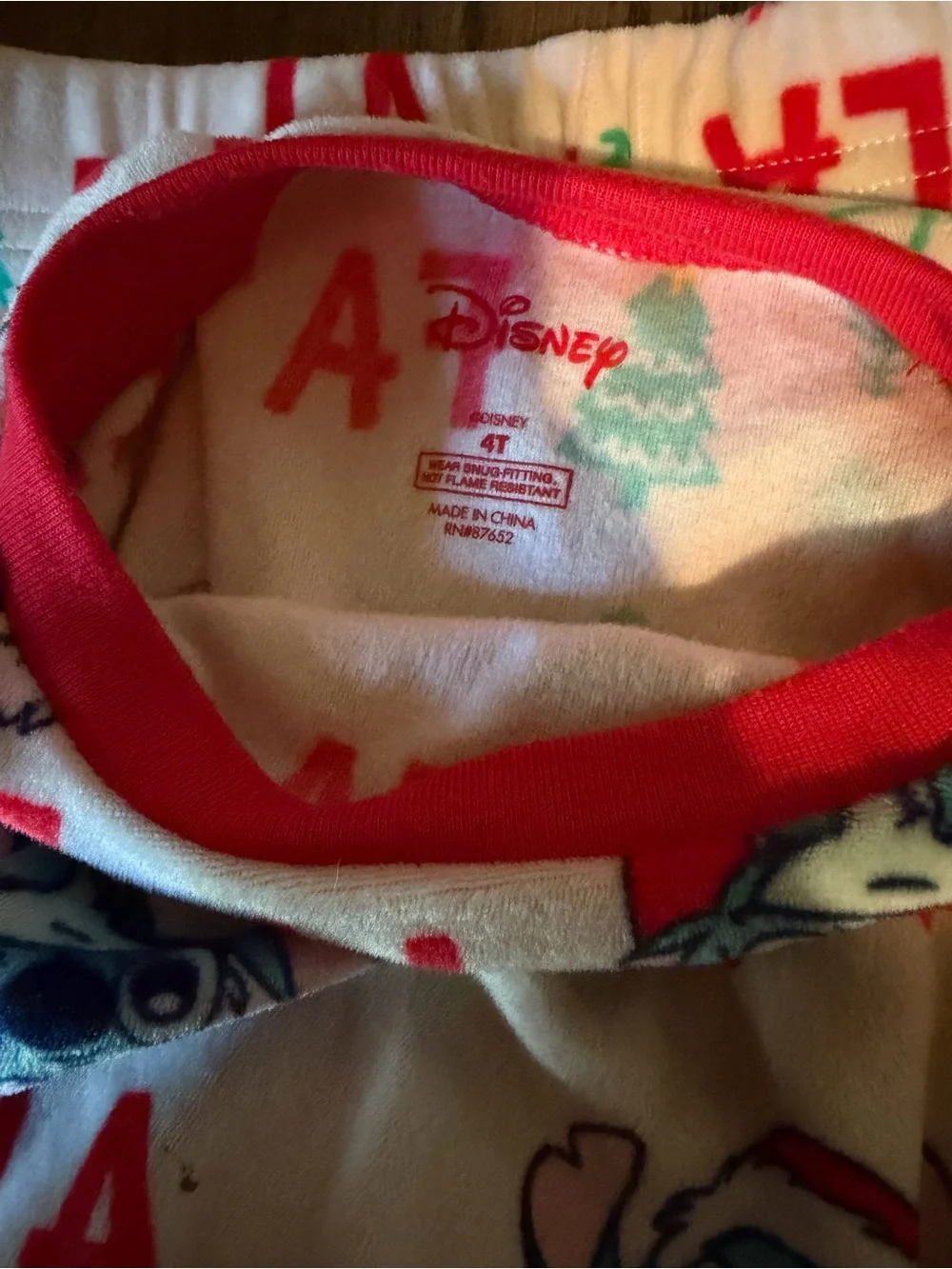Disney Cream Holiday Stitch Pajama Set with Red & Teal Accents